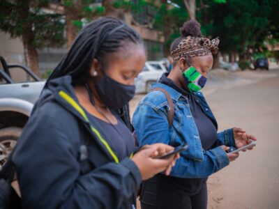 Zambia-EDGE-stock photo-young women with cell phones